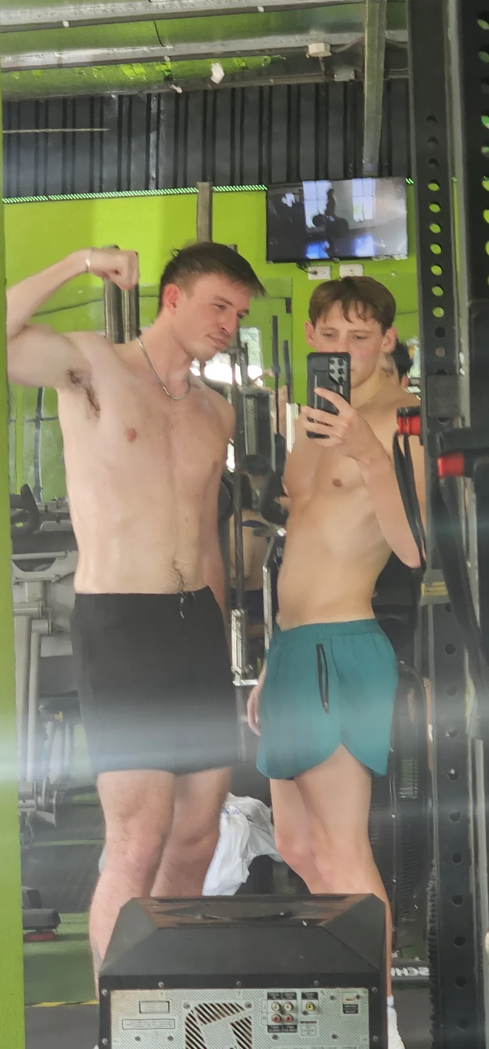 Post-lift mirror check at the gym