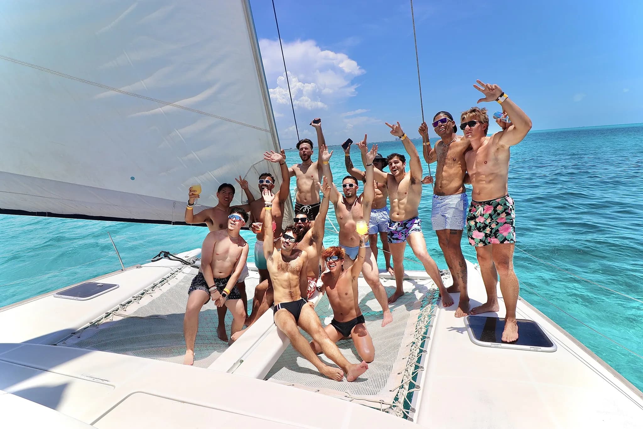 Arms up on the catamaran sail deck