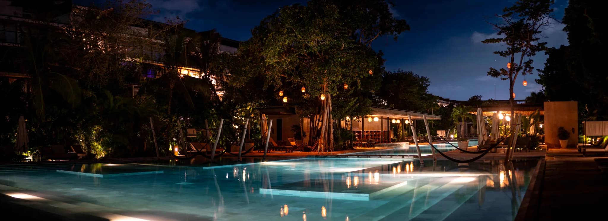 The villa pool after dark