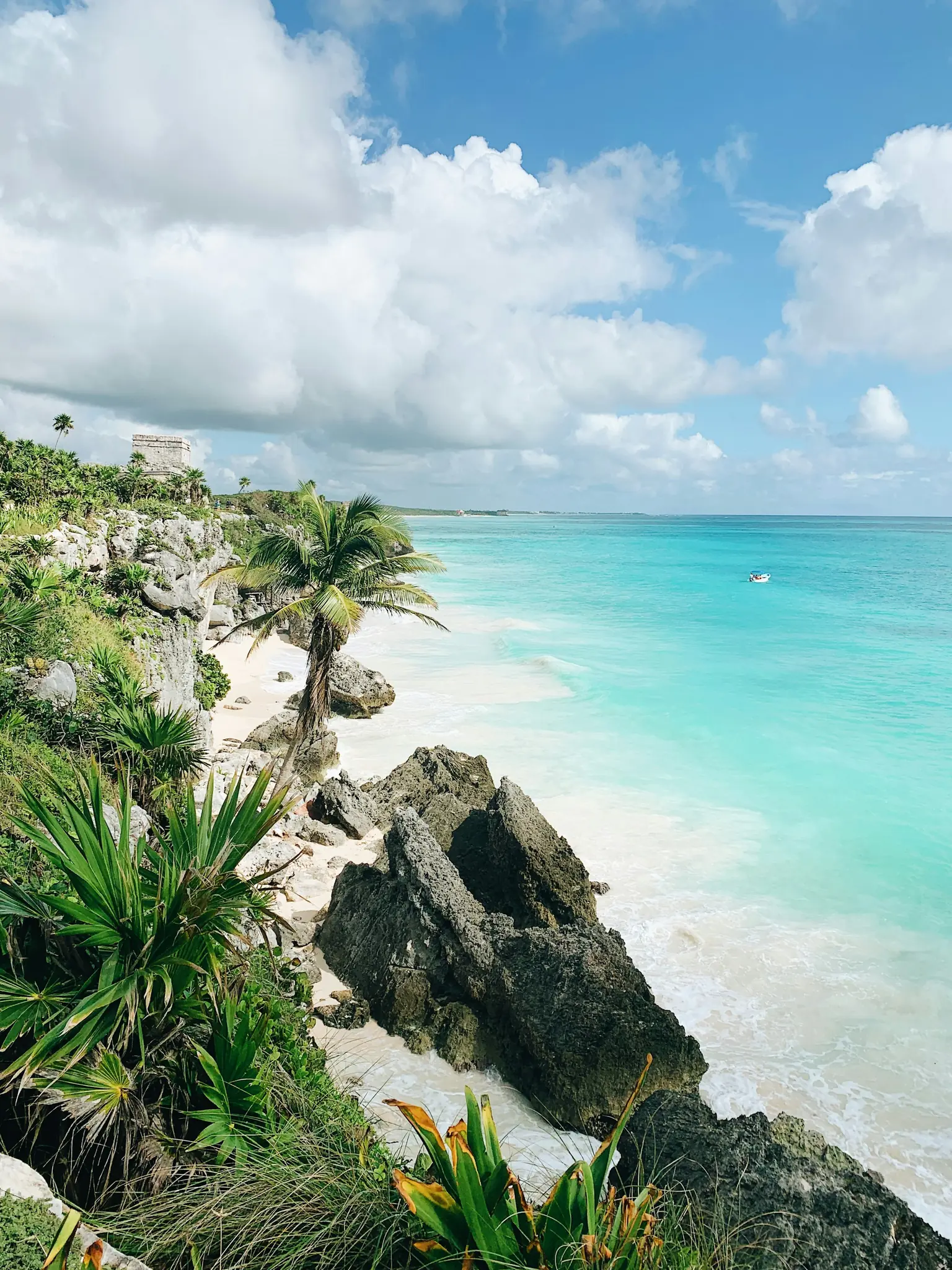 Turquoise Caribbean water off a Mexican beach, the setting for most all-inclusive gay resorts