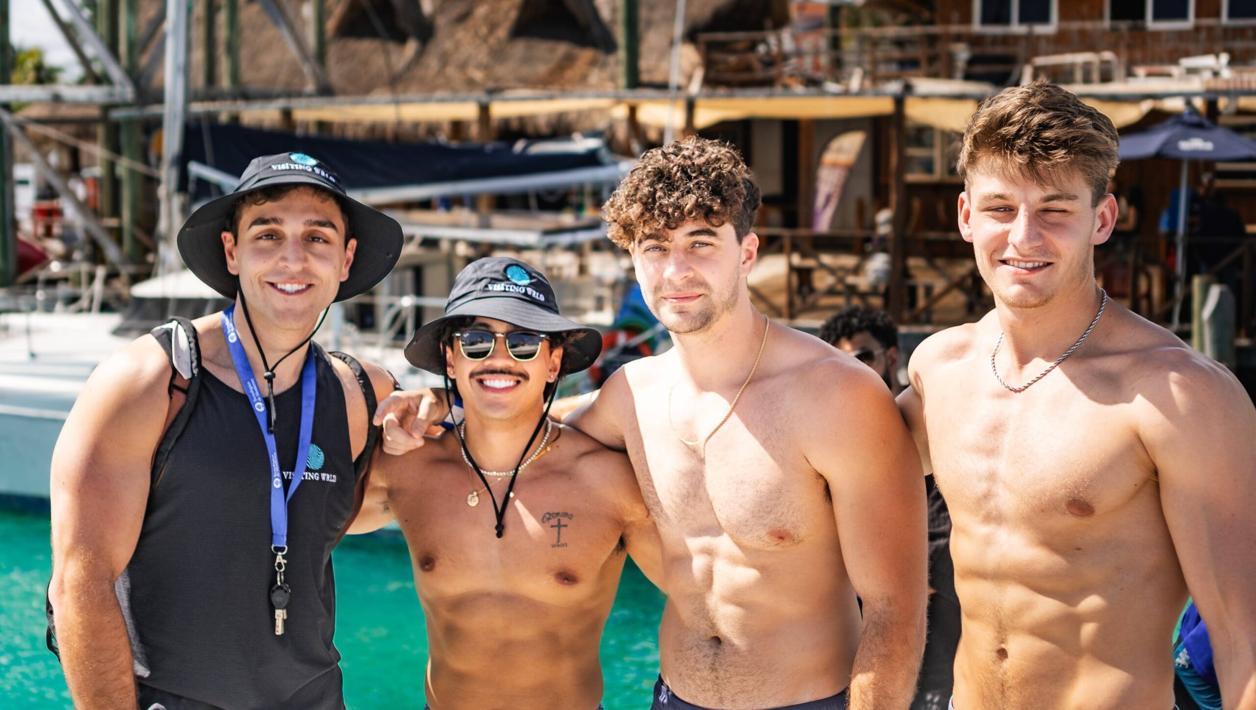 A group of gay men together at sunset on a Visiting Wrld trip